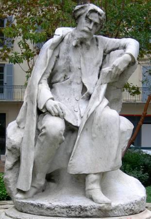 La statue d'Alphonse Daudet, à Nîmes..."...